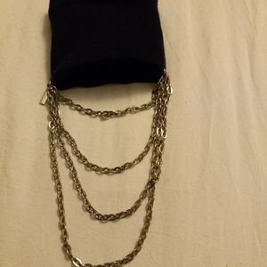 Black cotton material with silver layer chains